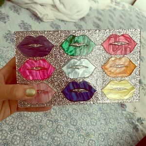 Silver Glitter Lip XOXO Clutch from Neiman Marcus